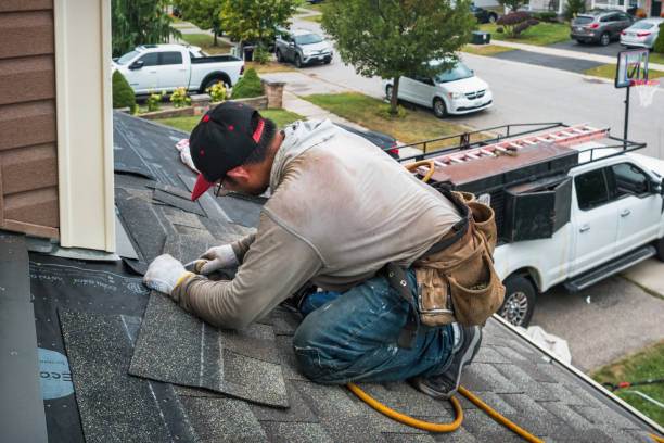 Professional Gutter Installation technician working in Hempstead, NY